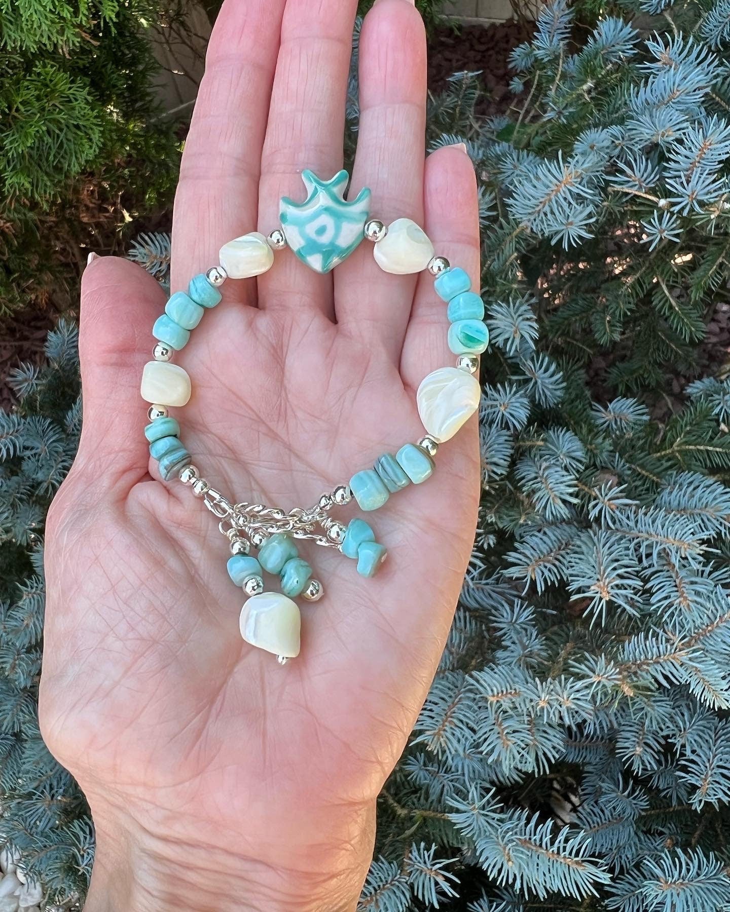 Turquoise colored shell and white shell nugget bracelet