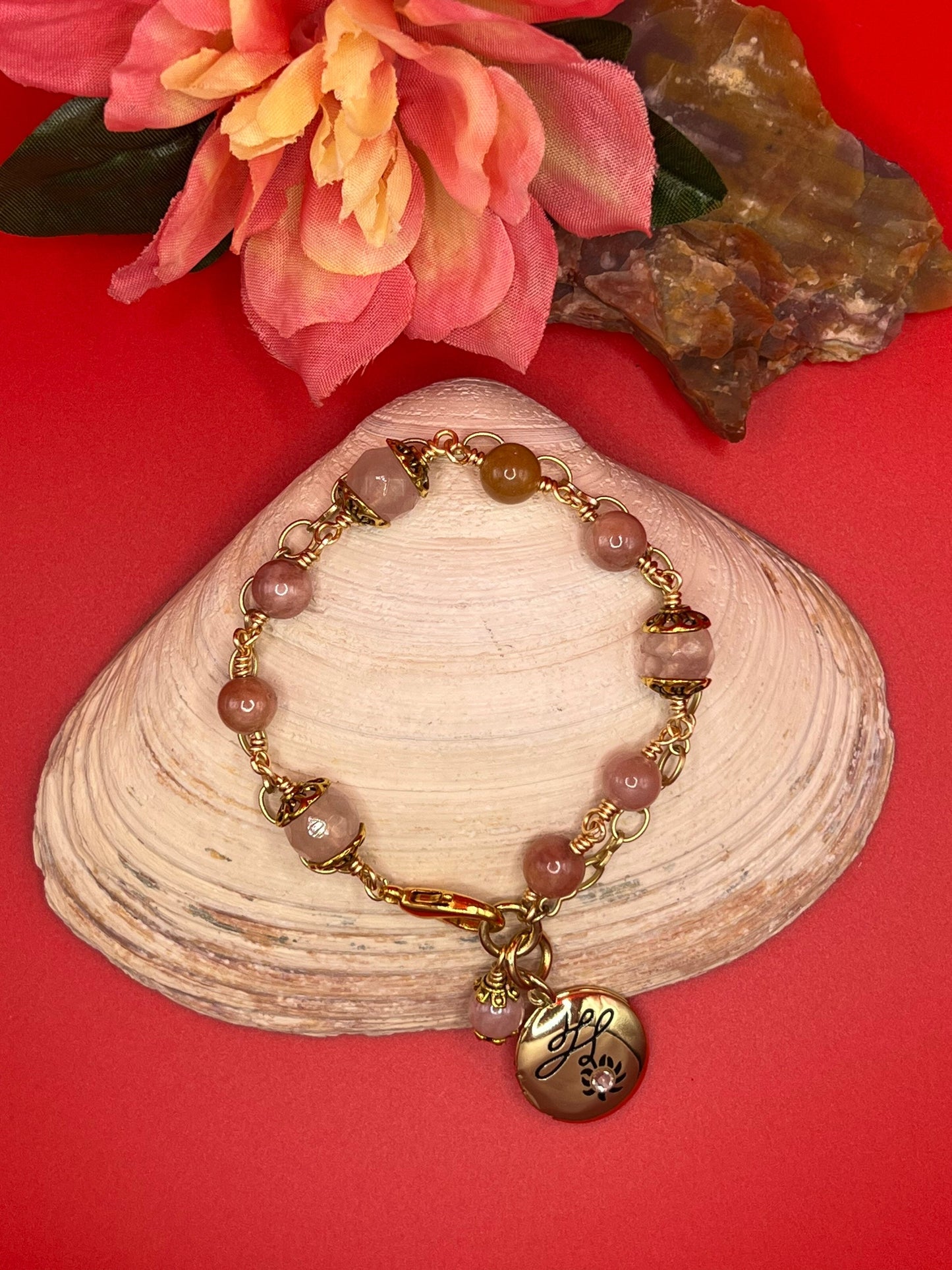 Rose quartz and sunstone wire wrapped bracelet.