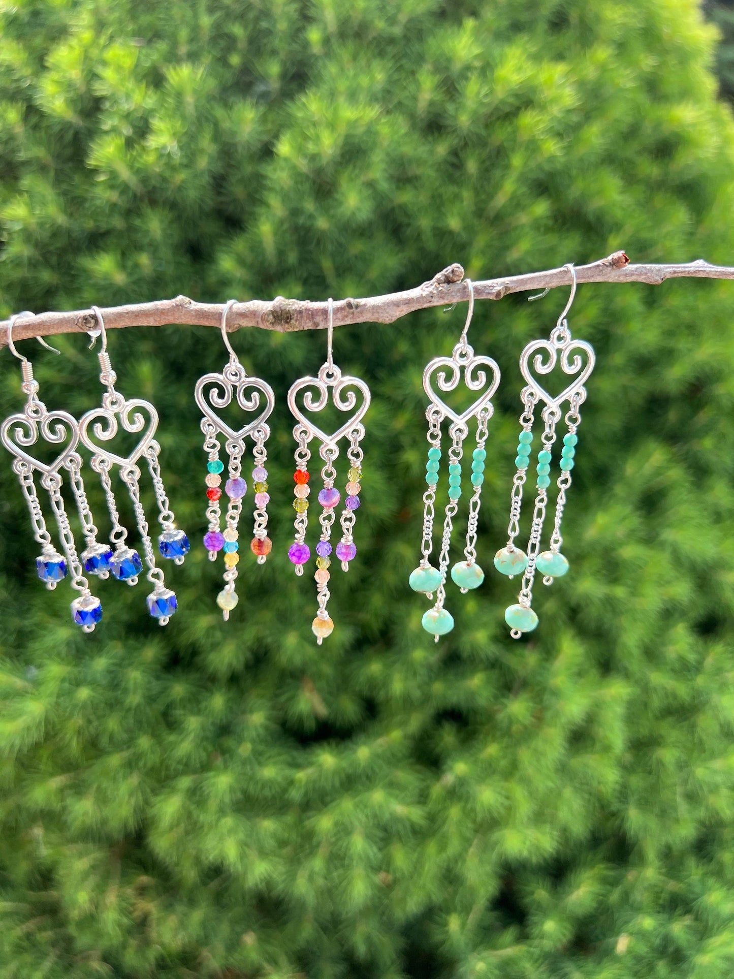 Silver plated heart dangle earrings