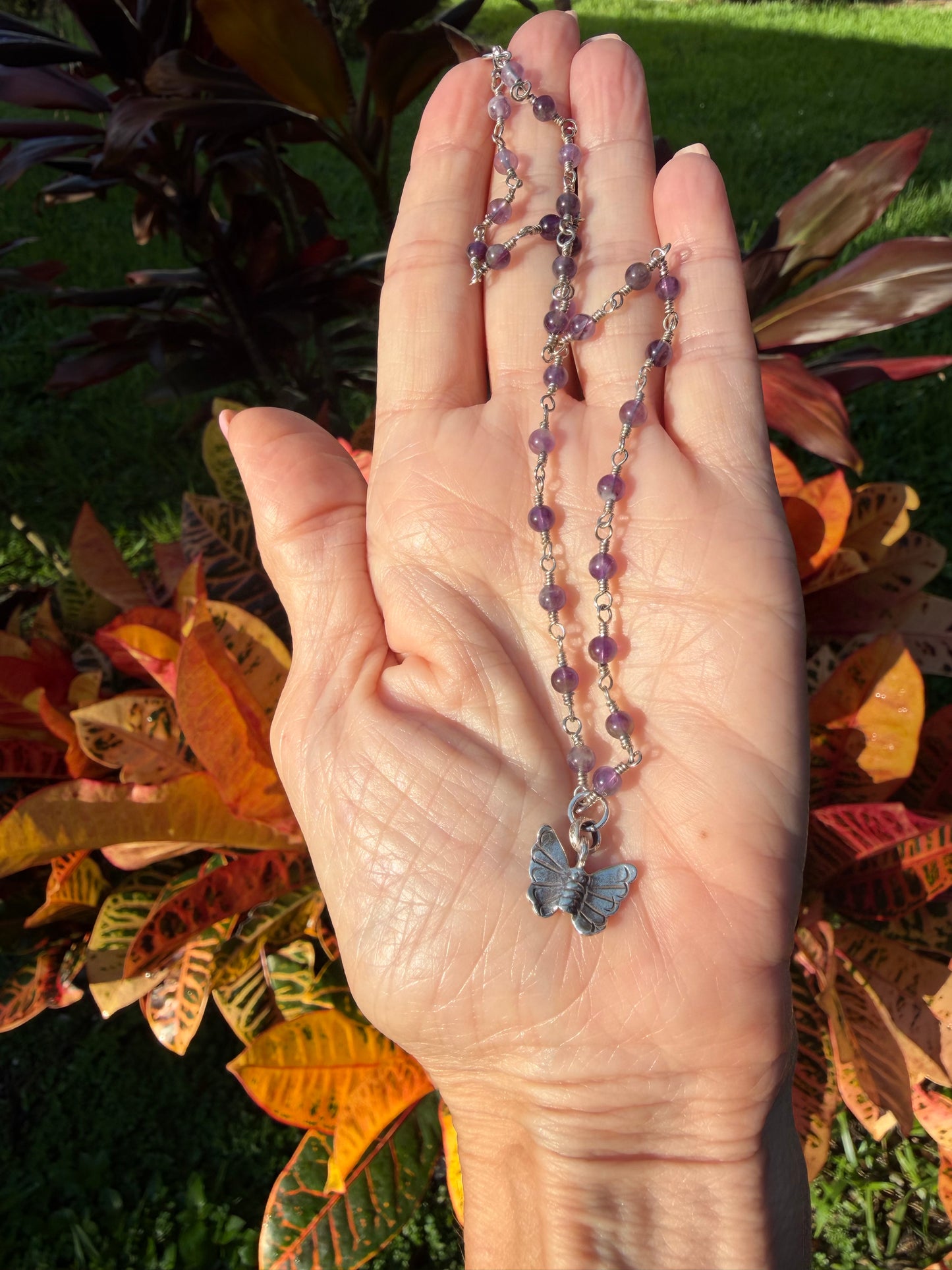 Amethyst choker with butterfly pendant